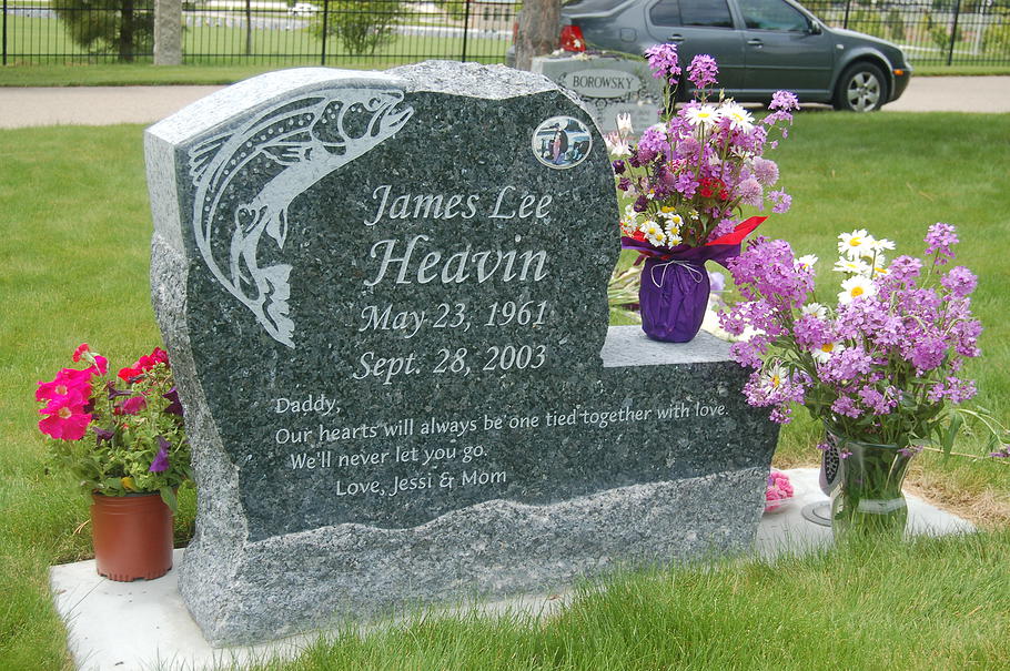 Harp-leg granite memorial bench